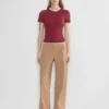 Chino-Hose mit hohem Bund und breiten Falten Chino-Hose mit hohem Bund und breiten Falten