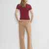 Chino-Hose mit hohem Bund und breiten Falten Chino-Hose mit hohem Bund und breiten Falten